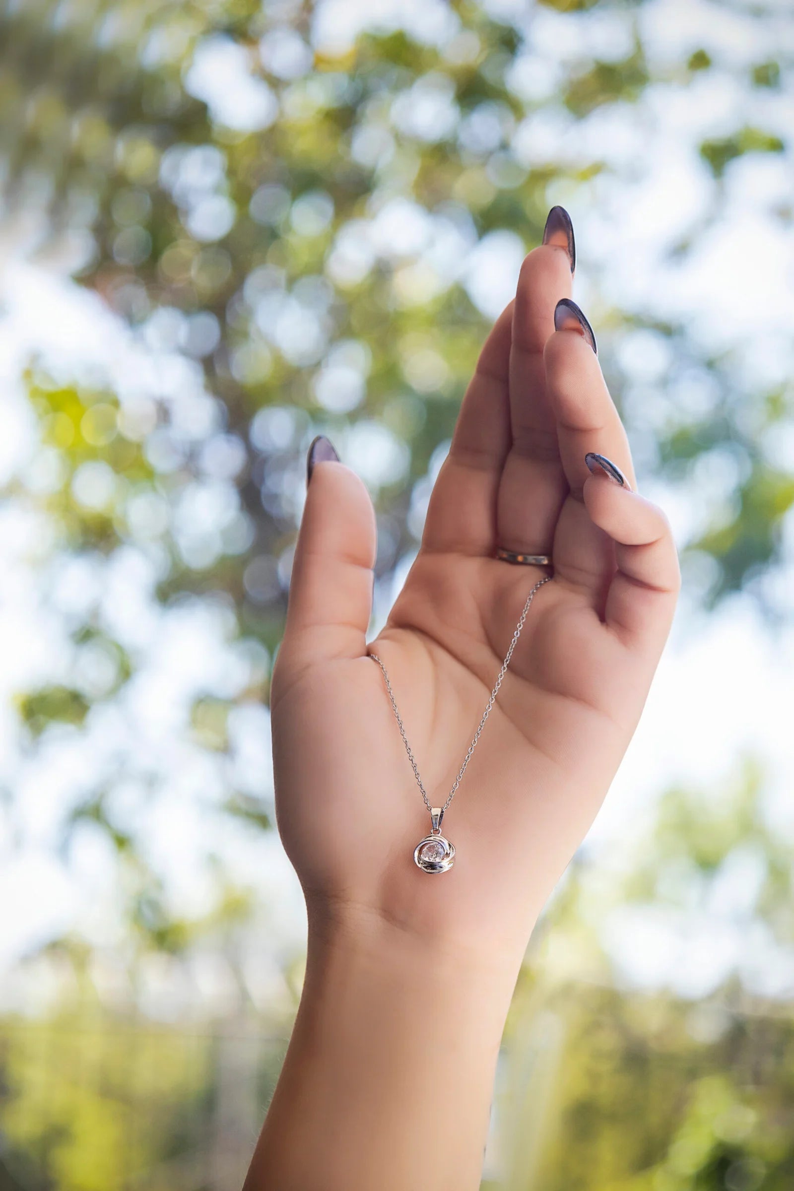 Rose Orbit Crystal Pendant Necklace for Women – Elegant Silver Chain