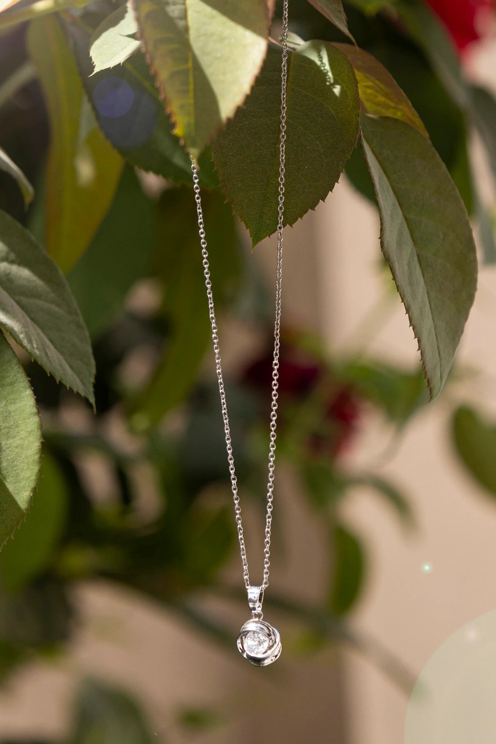 Rose Orbit Crystal Pendant Necklace for Women – Elegant Silver Chain