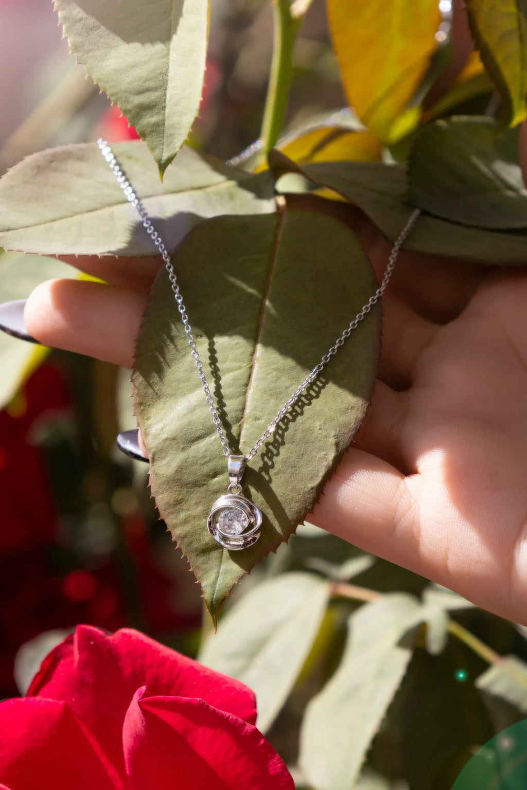 Rose Orbit Crystal Pendant Necklace for Women – Elegant Silver Chain
