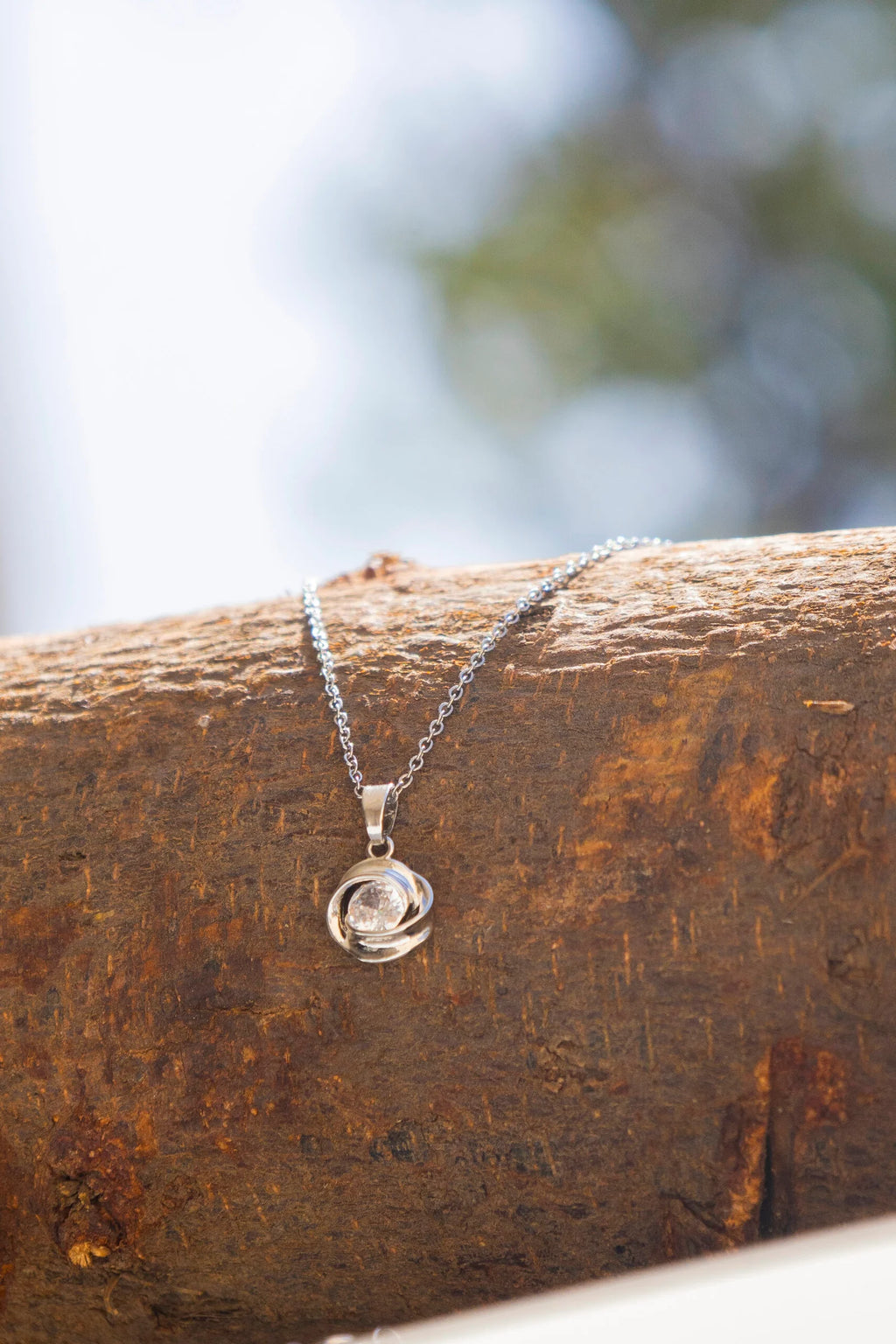 Rose Orbit Crystal Pendant Necklace for Women – Elegant Silver Chain