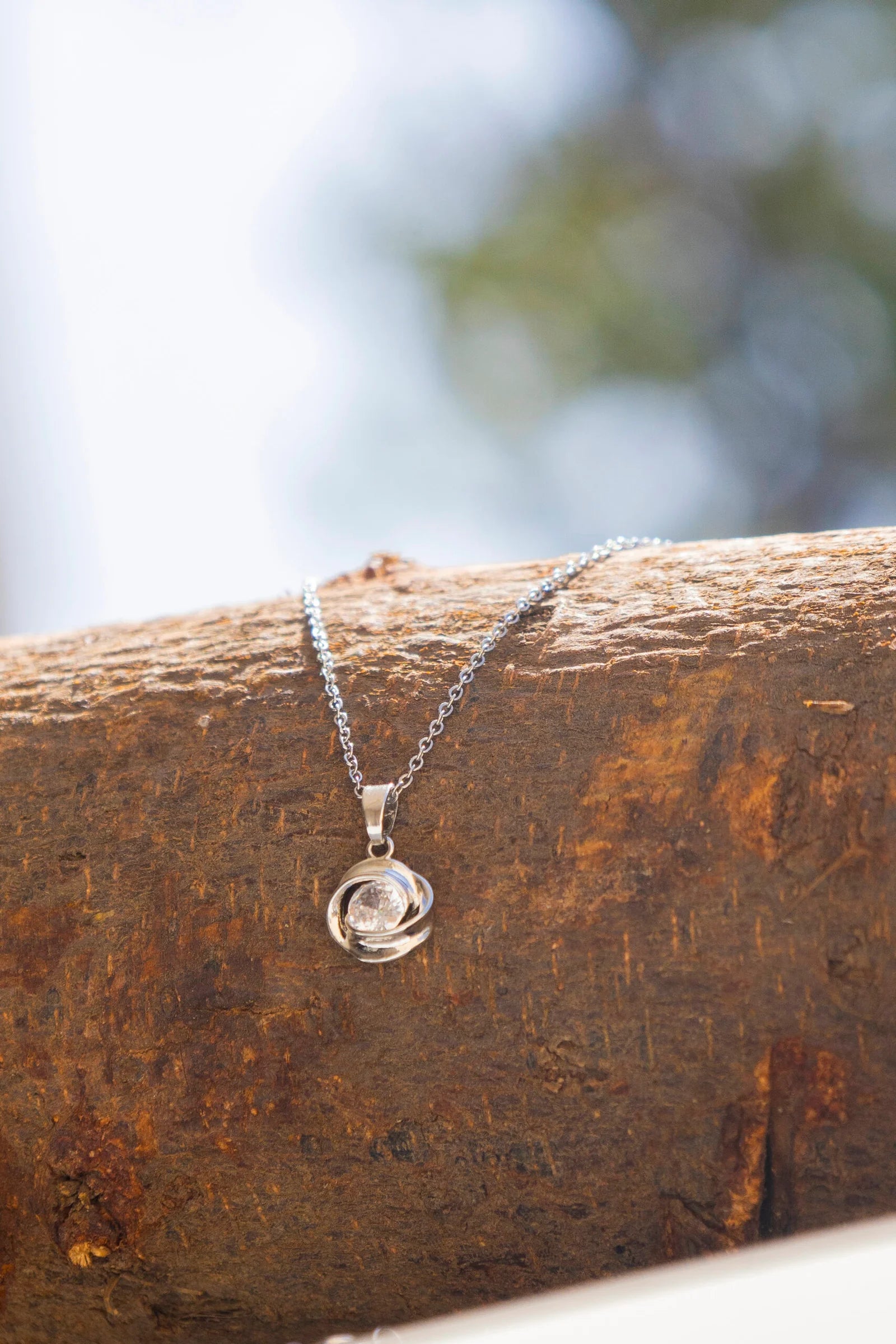 Rose Orbit Crystal Pendant Necklace for Women – Elegant Silver Chain